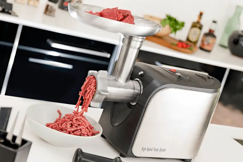 How does a meat grinder work